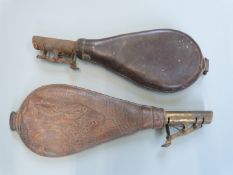 Two leather shot flasks with belt loops, largest 25cm long.