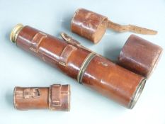 Negretti & Zambra three draw brass and leather telescope no 15426, with broad arrow mark, together