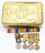 WW1 Princess Mary Christmas tin together with four miniature medals and ribbons
