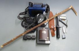A collection of gun and shooting related items including Nightsearcher 750, Rambo First Blood