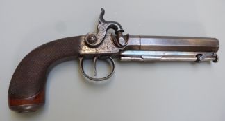 James of London percussion hammer action pistol with engraved locks, trigger guard, butt plate and