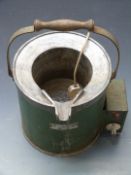 An industrial lead melting pot suitable for a gunsmith.