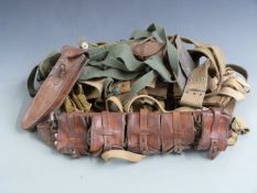 Quantity of canvas and leather accoutrements including map case, compass holder, bandolier,