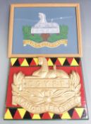 Two plaques for the Gloucestershire Regiment, one a framed example finished in wool, 38 x 30cm,