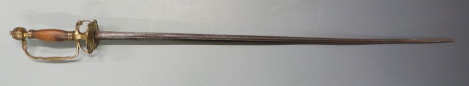 Continental late 18th/early 19thC sword with wooden grip, brass hilt guard and 74cm hollow ground