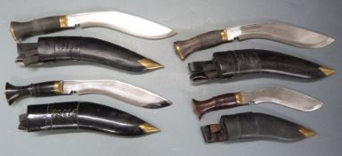 Three kukris by G K & Co Nepal and one other example, all with sheaths, largest blade 27cm. PLEASE