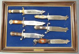 A set of six Franklin Mint Bowie knives, including 'The Trapper' and The Gold Rush' examples, all