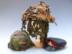 Three British Army hats including Royal Artillery No 1 dress cap size 7 3/8, Cold War steel helmet