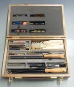 Mountaineer multi-gauge shotgun, rifle and pistol cleaning kit, in fitted wooden box.