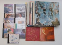 A collection of albums and CDs including Stevie Winwood, Traffic, Arthur Brown, Marianne