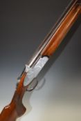 Rizzini 12 bore over and under ejector shotgun with engraved scenes of birds to the sidelock