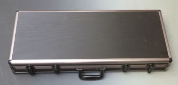 Shotgun or rifle hard flight or travel case with padded interior, 81x34x12cm.