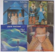 Approximately 90 albums including The Beatles, Blondie, David Bowie, Kate Bush, Bob Dylan, Peter