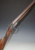 Unnamed English 12 bore side by side hammer action shotgun with engraved lock, hammers, trigger