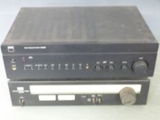 Sansui Tu-217 AM/FM stereo turner, together with an NAD C355 BEE stereo integrated amplifier
