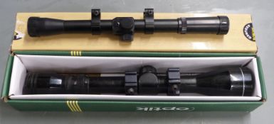 Two rifle scopes BSA SMK 4x20 and one other 3-9x40, both in scope boxes.
