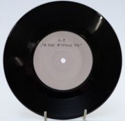 U2 - A Day Without Me (WIP6630) one sided white label, appears at least VG