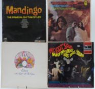 Approximately 30 albums including Queen, The Beatles, Paul McCartney, The Carpenters, George