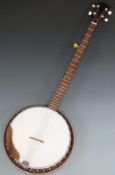 A five string banjo of Japanese manufacture with steel reinforced neck