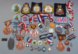 Small collection of USAF Volksmarch and other Walking Club commemorative medals together with glider