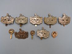 Ten British Army Gloucestershire Regiment metal badges including a Territorial / Volunteer