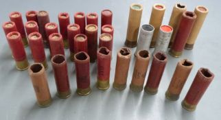 Seventeen 8 bore shotgun cartridges together with a collection of 8 and 4 bore empty cases some