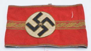 German Third Reich Nazi party armband for a district leader (Gauleiter). Black Swastika on white
