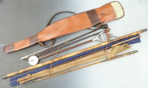 A sporting lot including gun slip, shooting stick, walking sticks made from gun cleaners, cane