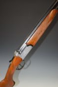 Contento 12 bore over and under shotgun with engraved locks, top plate and top lever, chequered