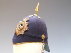 British Army Home Service style blue cloth helmet for the Gloucestershire Regiment