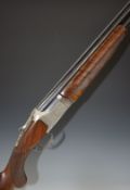 Winchester Grand European 12 bore over and under ejector shotgun with finely engraved locks,