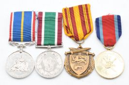 Oman A S Summood Medal, Dunkerque Medal, Women's Voluntary Service Medal and a National Service