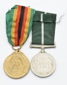 Zimbabwe Independence Medal 1980, stamped 23309 to rim, together with Pakistan Independence Medal