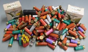 A large collection of mainly 20 bore shotgun cartridges together with three shotgun chokes. PLEASE