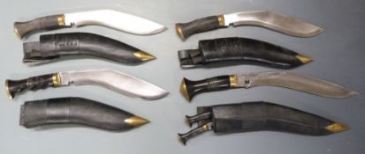 Four kukri knives two with GK & Co to ricasso, all with sheaths, largest blade 32cm. PLEASE NOTE ALL