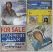 Approximately 120 albums including Simon and Garfunkel, Harpers Bizarre, George Harrison, ELO,