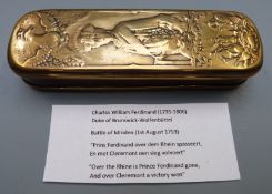 An 18thC brass tobacco box commemorating the Battle of Minden with rubbed engraving to lid of the
