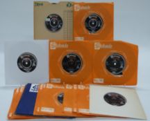 Promo / Demo - 19 singles on black or orange Stateside