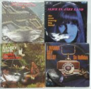 Approximately 120 albums mostly Jazz including Miles Davis, Louis Armstrong, Blossom Dearie, Chris