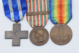 Three Italian WW1 medals including War Merit Cross medal, 1914-1919 War Medal with laurel leaf clasp