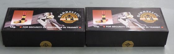 Two Barrelloc 12 bore shotgun barrel locks, new in original boxes.
