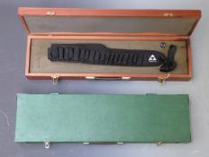 Two wooden shotgun or rifle hard carry cases, 115 x 29 x 11.5cm and 80 x 25 x 8cm.