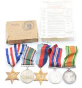 British Army WW2 medals comprising 1939-1945 Star, France and Germany Star, War Medal and Defence