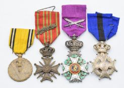 Four Belgium medals comprising Order of Leopold II, Military Order of Leopold II, Croix de Guerre