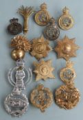Fourteen British Army Household Division and Royal Armoured Corps cap badges including Blues and