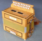 Saltarelle Berry melodeon D/G stepped keyboard, eight bass and 21 treble keys, inlaid fruitwood