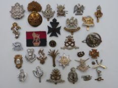Twenty-seven British Army badges including 8th Battalion King's Liverpool Regiment (Firmin, London),