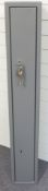 Three gun shotgun cabinet/safe, 132.5x20x22cm.