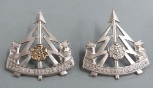 Two British Army Reconnaissance Corps West Riding Division metal cap badges