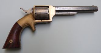 Lucius W Pond .32 six-shot single action rimfire revolver with brass frame shaped wooden grips,